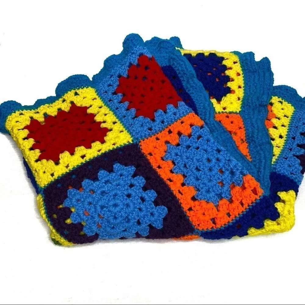 Hand crocheted bright multi colored Afghan size 56” X 31”